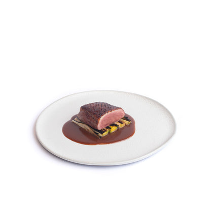 Magret de canard grillé à l'ail noir